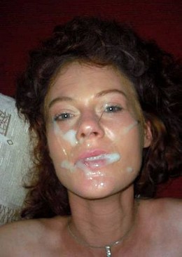 Curly houwife with lots of cum on her