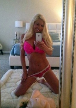 Hot blonde in pink lingerie selfie