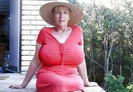 Boobed old lady in the red