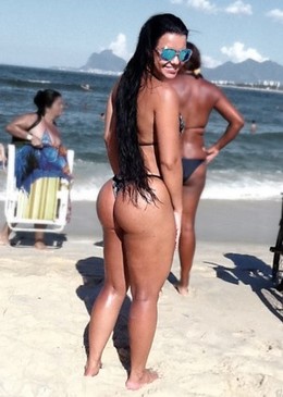 American girl on beach in bikini have